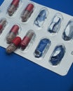 The drug in capsules. Capsules lie in plastic transparent packaging Royalty Free Stock Photo