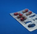 The drug in capsules. Capsules lie in plastic transparent packaging Royalty Free Stock Photo