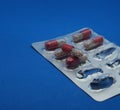 The drug in capsules. Capsules lie in plastic transparent packaging