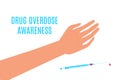 Drug overdose awareness day with an arm and a syringe