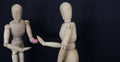 drug pill dealing taking series with wooden manikin figures