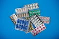 Drug therapy, pharmaceutical branch, group of different colorful pills in blister packs