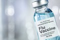 Drug vial with influenza vaccine Royalty Free Stock Photo