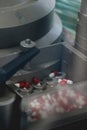 Drugs in Pharmaceutical machine close up