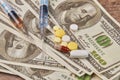 Drugs with money close up. Royalty Free Stock Photo