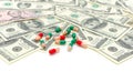 Drugs and money on a white background Royalty Free Stock Photo