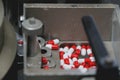 Drugs in Pharmaceutical machine close up