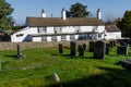 The Druid Inn country pub in Gorsedd seen from across the grave yard