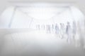 People walking through the long tunnel. Vector illustration. Royalty Free Stock Photo