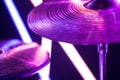Drum cymbal close-up, on a background of colored lanterns. Royalty Free Stock Photo