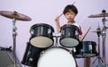 Drum kit or drum ent with blur boy playing background Royalty Free Stock Photo