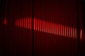 Drum with red fiber cords in PVC with partial light making an abstract view Royalty Free Stock Photo