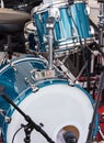 drum set and microphones standing outdoors stage before performance of street musicians