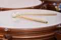 Drum sticks lying on the timpani