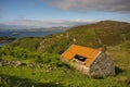 A traditional Scottish Highlands blackhouse at Drumbeg Viewpoint Royalty Free Stock Photo