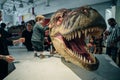 Drumheller, Canada - Mar 2023 Visitors flock to the dinosaur exhibits at the entrance of the Royal Tyrrell Museum Royalty Free Stock Photo