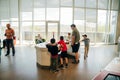 Drumheller, Canada - Mar 2023 Visitors flock to the dinosaur exhibits at the entrance of the Royal Tyrrell Museum Royalty Free Stock Photo