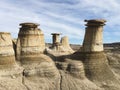 Drumheller HooDoos is a 0.5 kilometer heavily trafficked loop trail located near Drumheller, Alberta, Canada that features a cave Royalty Free Stock Photo