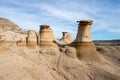 Drumheller HooDoos is a 0.5 kilometer heavily trafficked loop trail located near Drumheller, Alberta, Canada that features a cave Royalty Free Stock Photo