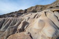 Drumheller HooDoos is a 0.5 kilometer heavily trafficked loop trail located near Drumheller, Alberta, Canada that features a cave Royalty Free Stock Photo