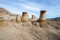 Drumheller HooDoos is a 0.5 kilometer heavily trafficked loop trail located near Drumheller, Alberta, Canada that features a cave Royalty Free Stock Photo