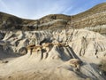 Drumheller HooDoos is a 0.5 kilometer heavily trafficked loop trail located near Drumheller, Alberta, Canada that features a cave Royalty Free Stock Photo