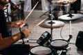 Drummer in action. A photo close up process play on a musical instrument