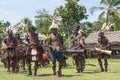 Drummer and dancers traditional asseccories in Papua New Guinea