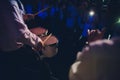 Drummer.The guy holding the drumsticks in his hand.Young man with drumsticks.A bearded man holding a stick in his hands