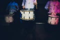 Drummer.The guy holding the drumsticks in his hand.Young man with drumsticks.A bearded man holding a stick in his hands