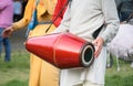 Drummer hands playing Mridanga or Satnam drum with light and cheerful clothes