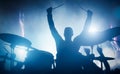 Drummer playing on drums on music concert. Club lights Royalty Free Stock Photo