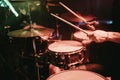 Drummer playing his drum kit on concert in club Royalty Free Stock Photo