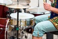 Drummer man playing drums percussion with sticks, drum kit on concert stage, drumsticks and drums Royalty Free Stock Photo