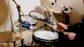 Drummer practicing percussion instruments at home during quarantine