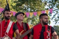 Drummers from the Dhol Foundation playing at an annual concert of Jewish Klezmer music in Regent`s Park in London UK. Royalty Free Stock Photo