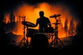 Drummers energy shines in silhouette against bold black backdrop