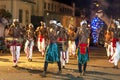 Drummers and flute players perform ahead of a parade elephant during the Esala Perahera in Kandy, Sri Lanka.