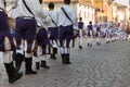 Drummers in White and Purple Uniform Playing Snare Drums Royalty Free Stock Photo