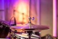 Drums, cymbals, hi hat on a beautiful background in the recording Studio. Room for musicians ` rehearsals. The concept of musical