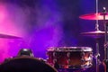 Drums and drum set. Beautiful blue and red background, with rays of light. Beautiful special effects of smoke and lighting Royalty Free Stock Photo