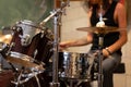 Drums in the foreground, drummer out of focus Royalty Free Stock Photo