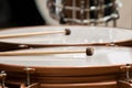 Drumsticks lying on timpani