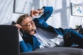 drunk businessman wearing glasses while lying