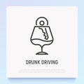 Drunk driving thin line icon: car key in wineglass with alcohol. Vector illustration