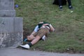 Drunk man sleeping at the Bavaria, Oktoberfest, Munich