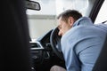 Drunk man slumped on steering wheel Royalty Free Stock Photo