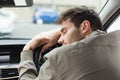 Drunk man slumped on steering wheel Royalty Free Stock Photo