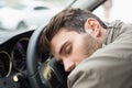 Drunk man slumped on steering wheel Royalty Free Stock Photo