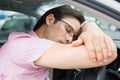 Drunk man slumped on steering wheel Royalty Free Stock Photo